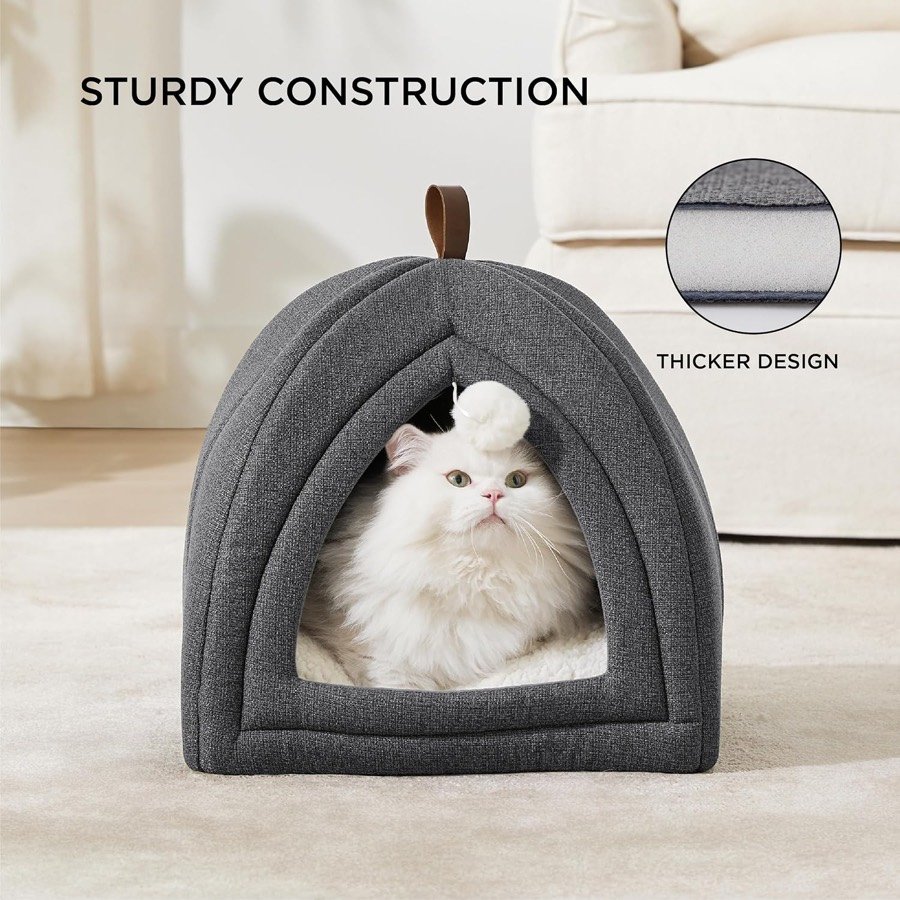 Ver imagen 2 de 6: Gato persa blanco dentro de la cama cueva Bedsure, con el detalle del grosor de la pared