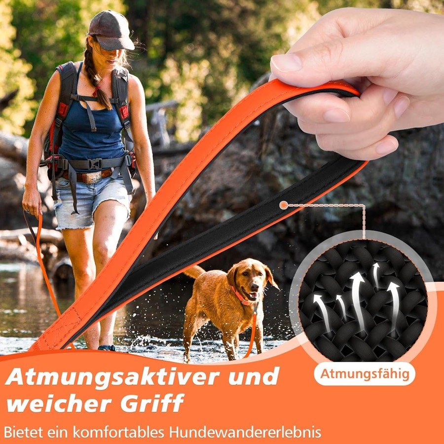 Ver imagen 4 de 6: Excursionista con mochila sujetando la correa naranja junto a un labrador, con un detalle del asa transpirable
