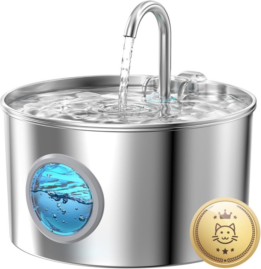Fuente GIOTOHUN de acero inoxidable con caño en forma de grifo y ventana circular azul que muestra el nivel de agua