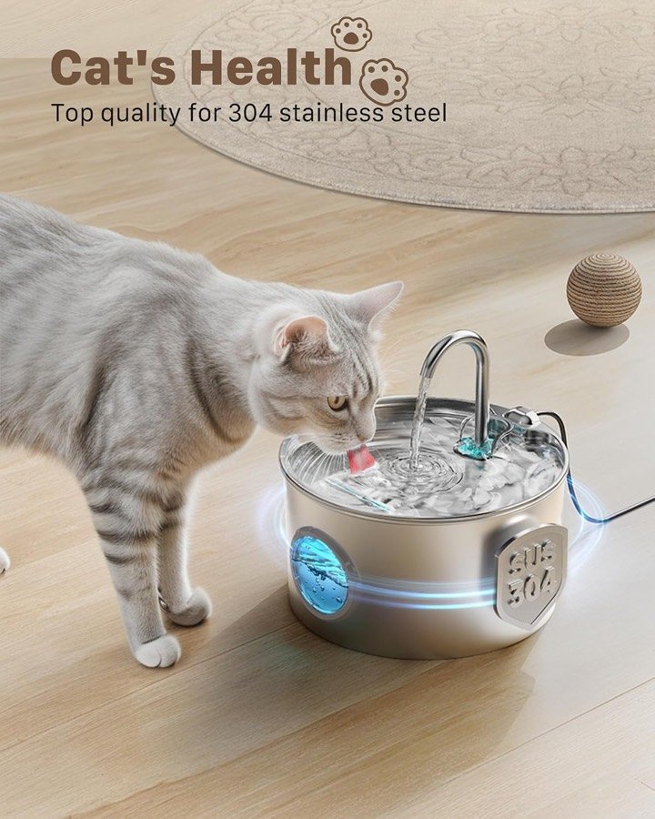 Ver imagen 2 de 6: Gato atigrado bebiendo del caño de la fuente GIOTOHUN, presentada como acero inoxidable 304