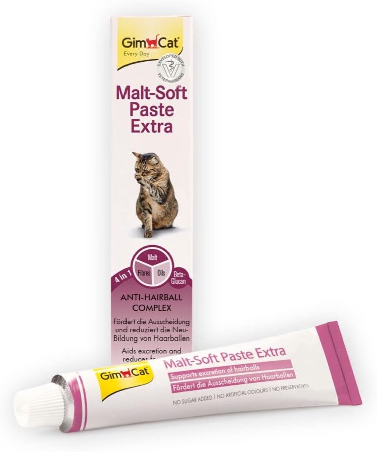 Caja y tubo de GimCat Malt-Soft Paste Extra antibolas de pelo, con un gato atigrado en el envase