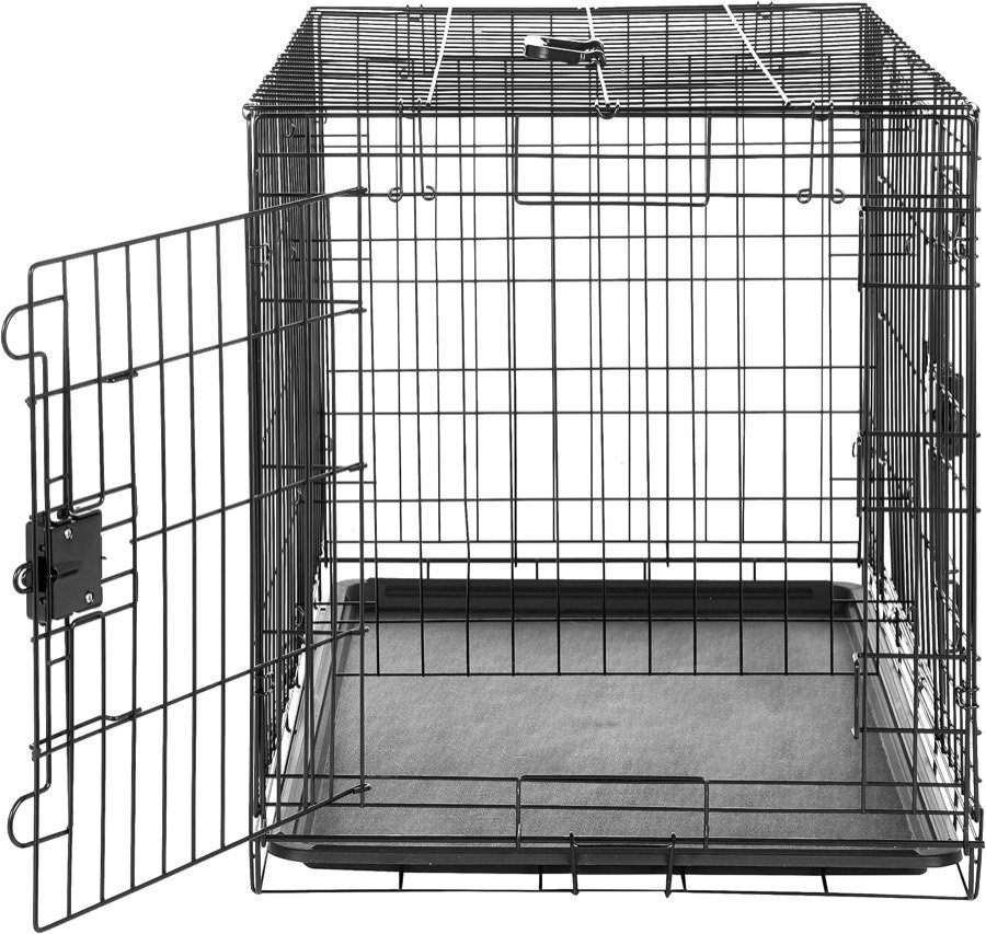 Ver imagen 4 de 6: Interior de la jaula Amazon Basics con la puerta abierta y la bandeja de plástico en la base