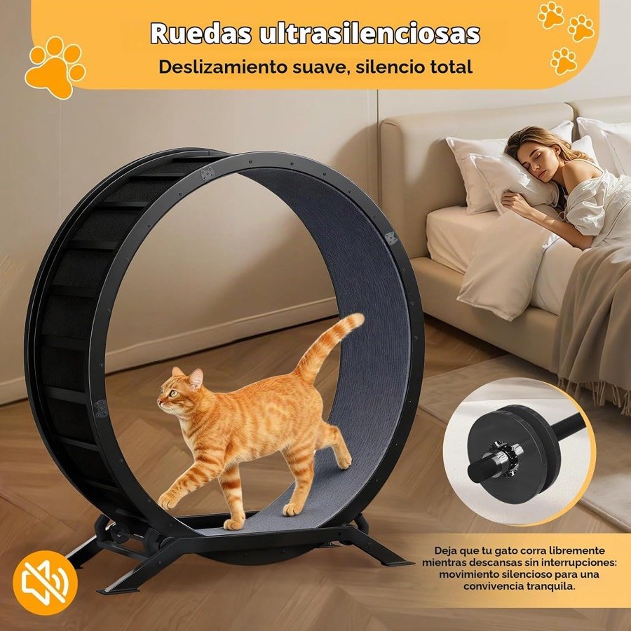 Ver imagen 2 de 6: Gato naranja caminando en la rueda junto a una cama, con detalle del rodamiento silencioso